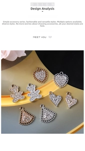 Detailed view of assorted rhinestone alloy pendants in heart and bear shapes for DIY jewelry