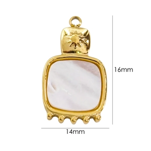 Detail view of a 16x14mm 14K gold-plated shell pendant with sun engraving and bead accents