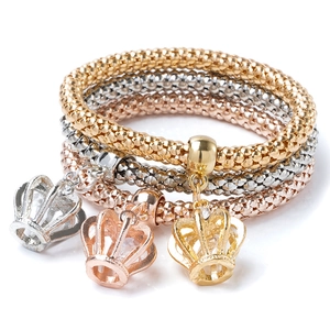 Detailed shot of three-piece stretch popcorn chain bracelets with crystal crown charms