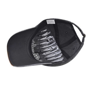 Detail view of cotton baseball cap interior featuring sweatband and adjustable back strap