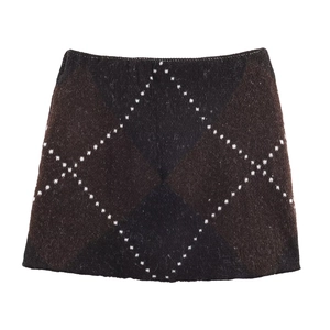Women's dark brown knit skirt with white diamond pattern and elastic waist detail