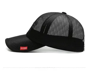 Close-up of black breathable mesh baseball cap with red brand label and adjustable fit