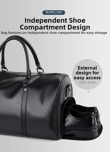 Close-up of a large black leather travel bag showing a side zipper shoe compartment