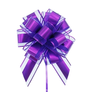 Detail of a purple and white matte spherical gift bow with metallic finish and textures