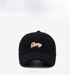 Detail of black fleece baseball cap featuring 3D Sany letter embroidery and textured fabric