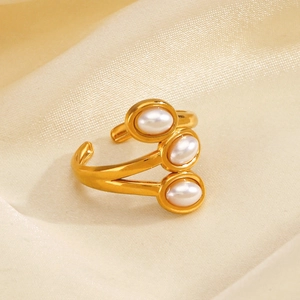 Elegant gold-tone adjustable open ring featuring three vertical white oval pearls