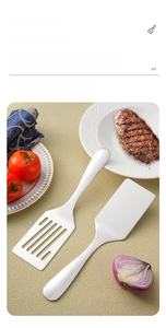 Detail of 304 stainless steel spatula set with SUS 304 engraving on matte metal handle