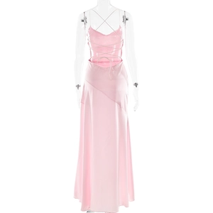 Detail of pink satin evening dress featuring an open back with crisscross tie-up straps