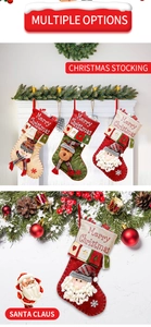 Detail of Christmas stocking set featuring Santa, Snowman and Reindeer with embroidery