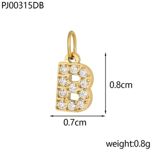 Macro view of gold letter B pendant with micro-pave zircons and 0.8cm size detail