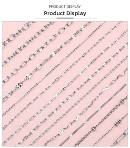 Macro view of various silver stainless steel chain styles including round and wave links