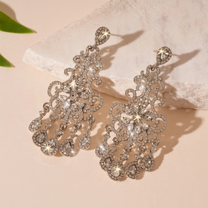 Luxury silver chandelier earrings with glittering crystal fringe and waterdrop pendants