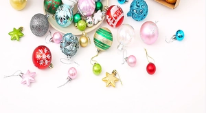 Macro view of colorful Christmas ball ornaments with glitter and matte finishes