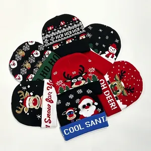 Christmas knit beanie featuring classic Santa, reindeer and snowman jacquard patterns