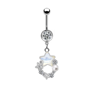 Detailed macro view of silver belly ring with star pendant and sparkling zircon stones