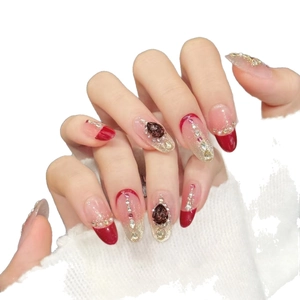 Elegant wine red and gold gradient press-on nails with luxury gems and pearls