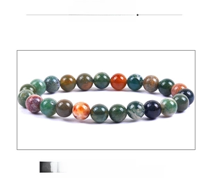 Detail of 8mm natural stone beads showing colorful forest green and blue mineral textures