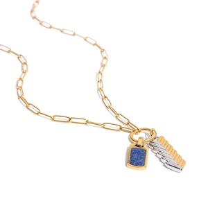 Lapis lazuli pendant necklace with gold paperclip chain and dual-tone striped metal charm