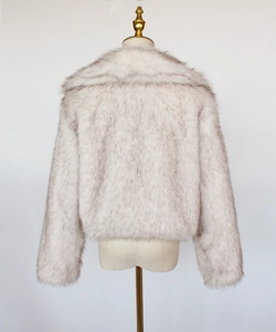 Back view of a faux fox fur short coat in gradient grey on a mannequin, soft texture