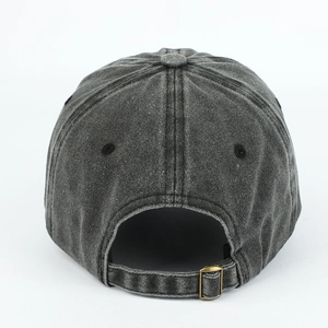 Detail view of washed dark gray cotton baseball cap with adjustable metal bronze buckle