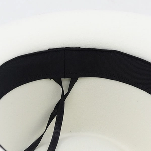 Detail of wool felt fedora interior with adjustable sweatband and drawstring cord