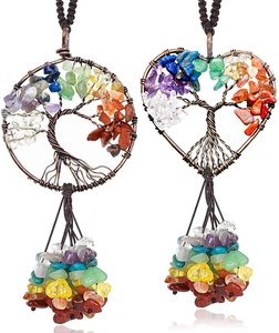 Detail of handmade Tree of Life wall hanging with round and heart-shaped natural stones