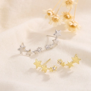 Elegant 925 sterling silver triple star stud earrings with diamonds in gold and silver