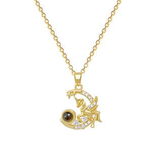 Pegasus and crescent moon pendant necklace in gold with shimmering crystal inlay