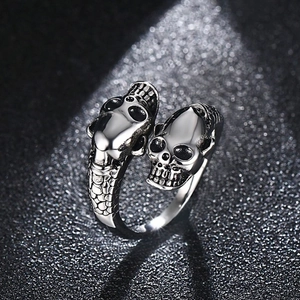 Vintage silver skull open ring for men with intricate snake scale carvings and dark details
