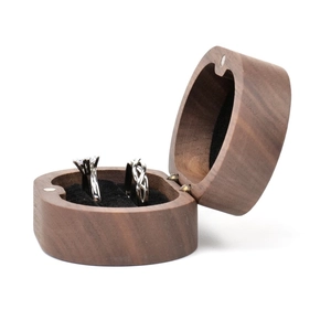 Handcrafted walnut wood ring box with black velvet interior and magnetic closure