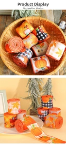 Detailed view of autumn pumpkin and maple leaf burlap ribbons for gift packaging