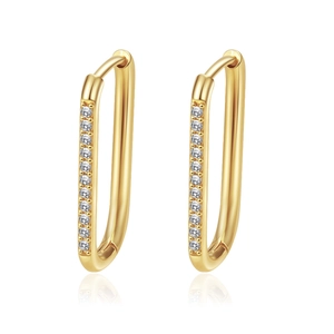 Detailed macro view of gold-plated rectangular hoop earrings with pavé cubic zirconia