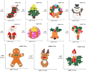 Detailed size chart and weight specifications for eleven colorful Christmas enamel pins