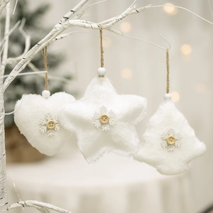 White plush Christmas tree ornaments featuring heart, star, and tree shapes with wood buttons