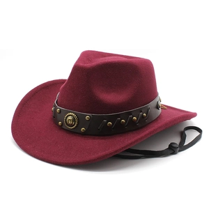 Detail of wine red wool felt cowboy hat with leather studded band and windproof cord