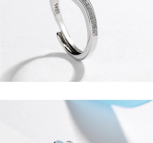 Close-up of S925 sterling silver stamp on the inner band of the sparkling zircon ring