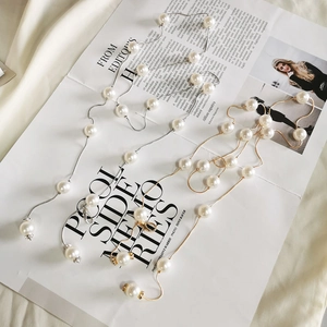 Elegant pearl waist chain belt for women in gold and silver finish with crystal accents