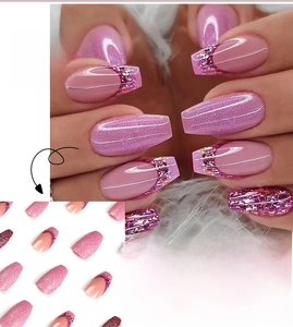 Detail of pink glitter French ombre press-on nails in long coffin shape design