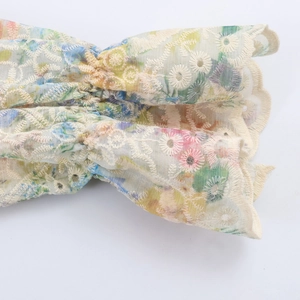 French style blouse featuring colorful floral embroidery on hollowed lace fabric detail