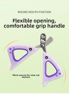 Detail of round hole stainless steel cat nail clippers with ergonomic purple fish handle