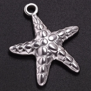 Macro view of silver 304 stainless steel starfish pendant with detailed texture
