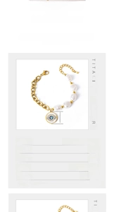 Detail view of gold evil eye pendant and freshwater pearl AB chain bracelet in titanium steel
