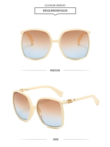 Front and side view of beige oversized sunglasses with gradient brown-blue lenses