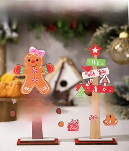 Christmas wooden gingerbread man and tree tabletop ornaments with festive lettering