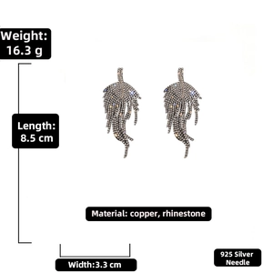 Detailed view of rhinestone leaf earrings with 925 silver needle, size 8.5cm by 3.3cm