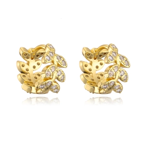 Detail view of 18K gold plated copper earrings with leaf design and sparkling zircons
