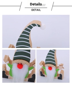Detail showing the wooden Christmas gnome with striped hat and white fiber beard