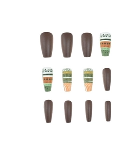 Detailed view of long ballerina press-on nails with matte brown and boho geometric patterns