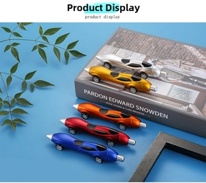 Close-up of creative racing car shaped ballpoint pens in five vibrant metallic colors