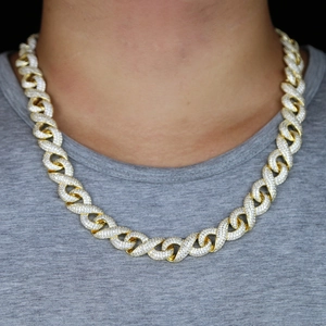 Close-up of gold plated 15mm link chain necklace with sparkling pave set zircons on model